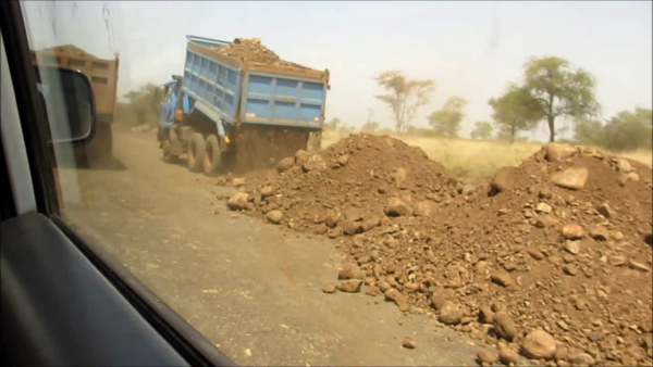Construction of roads to the sugar plantations from a DFID/USAID vehicle